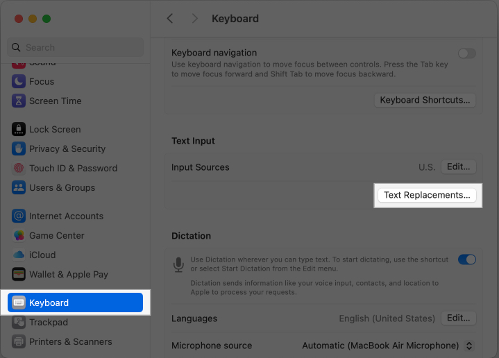 Accessing the Text Replacement feature in macOS System Settings