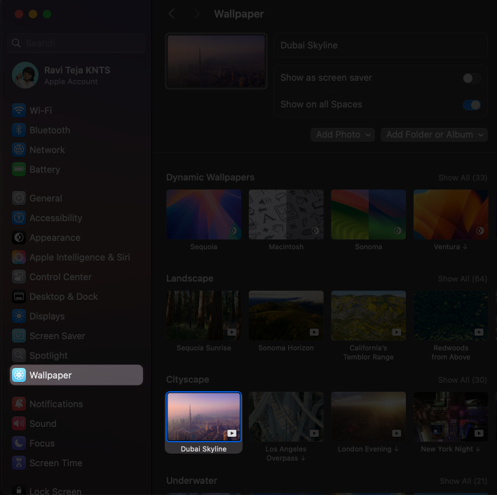 Choosing an Apple wallpaper and applying it to the desktop on a Mac
