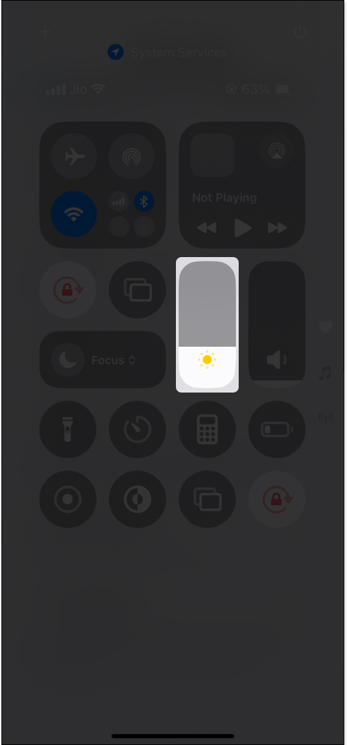 Manage brightness manually from control center on iPhone