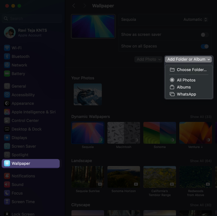Choosing the option to add albums or folders to set rotating wallpapers on a Mac