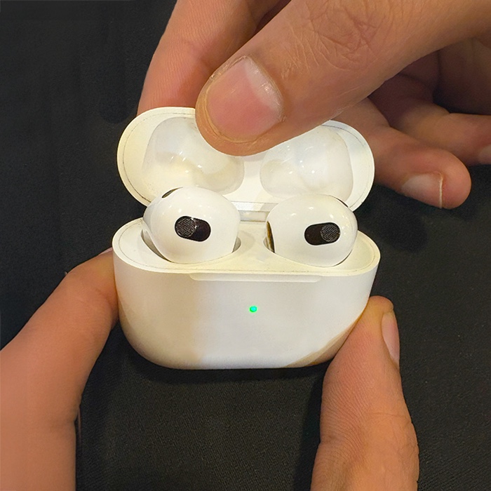 AirPods with the charging case open